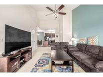 Comfortable living room featuring a ceiling fan and cozy furniture at 804 Summer Hawk Dr # 303, Longmont, CO 80504