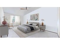 Bright bedroom with a ceiling fan, soft lighting, neutral tones, and stylish decor for a calm and inviting space at 775 S Alton Way # 3D, Denver, CO 80247