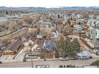 Gorgeous aerial view of the neighborhood and home in a desirable area with mountain views at 1253 N Quitman St, Denver, CO 80204