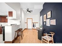 Elegant entryway boasting hardwood floors, and stylish decor elements for a welcoming ambiance at 2351 Federal Blvd # 102, Denver, CO 80211