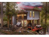 Unique contemporary home with mixed materials and deck in wooded setting at 167 Independence Cir, Breckenridge, CO 80424