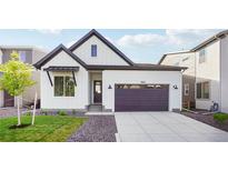 Beautifully landscaped two-story home with a two car garage and modern design at 5930 S Platte Canyon Dr, Littleton, CO 80123