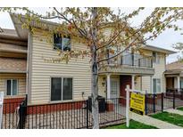 Charming two-story home featuring a fenced patio and balcony, creating inviting outdoor spaces at 7450 Lowell Blvd # B, Westminster, CO 80030