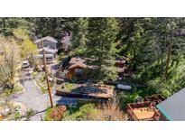 Charming mountain home with a terraced front yard and wood accents at 41 Silver Spruce, Boulder, CO 80302