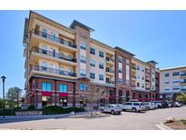 Beautiful exterior of a mixed use building with parking available and storefronts at ground level at 10111 Inverness Main St # 230, Englewood, CO 80112