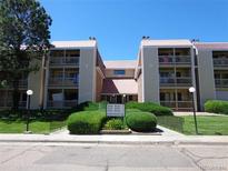 Attractive condo building featuring multiple units with balconies, landscaped grounds, and convenient parking at 14740 E Kentucky Dr # 725, Aurora, CO 80012