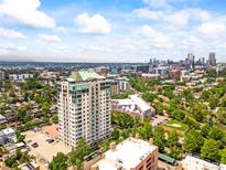 Stunning high-rise condo building with city views and vibrant green space at 400 E 3Rd Ave # 305, Denver, CO 80203