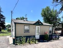 Charming single-story home featuring a new paint, a well maintained garden, and a welcoming front entrance at 1270 Havana St, Aurora, CO 80010