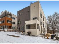 Modern multi-level home showcasing a contemporary design, neutral tones, and a welcoming front entrance at 1246 Xavier St, Denver, CO 80204