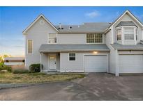 Inviting townhouse with attached garage and well-maintained landscaping at 12635 E Pacific Cir # A, Aurora, CO 80014