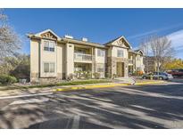 Attractive exterior of a two-story building with landscaping and parking at 10437 W Hampden Ave # 202, Lakewood, CO 80227