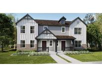 Charming modern farmhouse with brick accents, a welcoming front porch, and well-manicured landscaping at 15268 Detroit St, Thornton, CO 80602