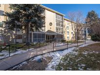 Inviting condo complex with accessible ramp and manicured landscaping at 3082 S Wheeling Way # 410, Aurora, CO 80014
