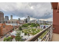 Stunning city skyline view from a condo balcony at 100 Park Ave # 908, Denver, CO 80205