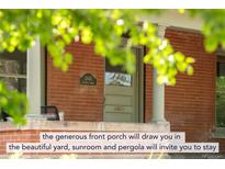 Charming brick home featuring a cozy front porch with classic architectural details at 2845 Quitman St, Denver, CO 80212
