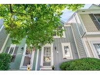Charming townhome with a well-maintained front yard and inviting entrance at 10819 Summerset Way, Parker, CO 80138