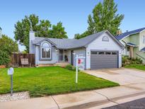 Charming single-Gathering home with a well-manicured lawn and two car garage at 12646 Osceola St, Broomfield, CO 80020