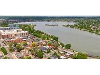Stunning aerial view of the property near a serene lake and city amenities at 1647 N Osceola St, Denver, CO 80204