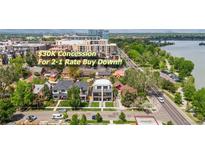 Stunning aerial view of houses with a $30K concession and 2-1 rate buy down promotion, perfect for savvy buyers at 1647 N Osceola St, Denver, CO 80204