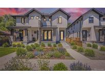 Charming modern home boasts beautiful landscaping, a stone porch, and a delightful exterior design at 2525 S Pearl St, Denver, CO 80210