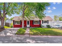 Charming single-story home with a well-maintained front lawn and mature trees at 2767 S Linley Ct, Denver, CO 80236