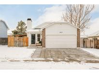 Charming single-Gathering home boasting a well-maintained lawn and a two-car garage at 637 Howe St, Castle Rock, CO 80104