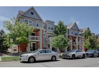 Charming townhomes with well-maintained landscaping and ample parking at 9520 Halstead, Lone Tree, CO 80124