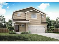 Charming two-story home with a two-car garage and well-maintained lawn at 48195 Shetland Dr, Bennett, CO 80102