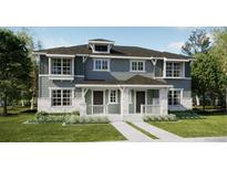 Two-story craftsman style home with gray siding, stone accents, and a front porch at 15242 Detroit St, Thornton, CO 80602