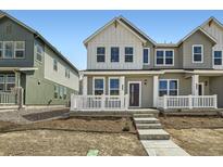 Charming two-story home with a welcoming front porch and a modern design at 708 N Bently St, Watkins, CO 80137