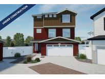 Two-story home with attached garage and landscaping at 22042 E 38Th Pl, Aurora, CO 80019
