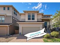 Charming two-story home with a modern design, two-car garage, and well-maintained brick driveway at 3116 Jonquil St, Castle Rock, CO 80109