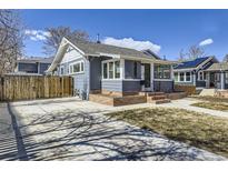 A beautiful property featuring a well-maintained yard and a long driveway at 4441 N Meade St, Denver, CO 80211