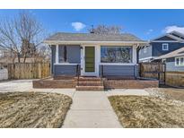 Charming single-story home with a well-maintained front yard and inviting entrance at 4441 N Meade St, Denver, CO 80211