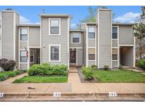 Charming townhome featuring well-maintained landscaping and a welcoming entrance at 4621 S Fraser Cir # B, Aurora, CO 80015