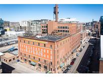 Denver's Refractory Building, also known as the Ice House, is a brick building with a water tower at 1801 Wynkoop St # 518, Denver, CO 80202