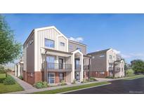 Modern two-story townhouses with brick and siding exteriors at 4537 Tabor St, Wheat Ridge, CO 80033