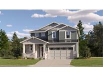 Two-story craftsman style home with gray siding, stone accents, and a two-car garage at 24736 E Evans Dr, Aurora, CO 80018