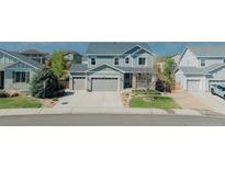 Charming two-story home featuring a three-car garage and well-maintained landscaping at 7665 Grady Cir, Castle Rock, CO 80108