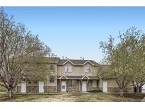 Inviting townhomes with stone accents and mature trees in a well maintained community at 2139 Coronado Pkwy # B, Denver, CO 80229
