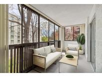 Enclosed balcony with seating and view at 3470 S Poplar St # 102, Denver, CO 80224