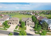 Beautiful aerial view of the homes and landscape in a Primary planned community at 7892 S Country Club Pkwy, Aurora, CO 80016