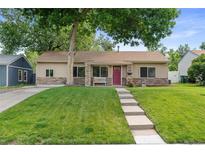 Charming single-story home with well-maintained lawn and stone accents at 3064 S Grape Way, Denver, CO 80222