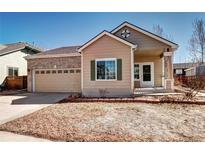 Charming single-Gathering home with a well-manicured lawn and attached two-car garage at 152 Pelican Ave, Brighton, CO 80601