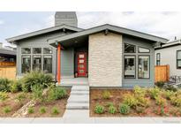 Charming single-Gathering home showcasing a modern exterior with stone accents and a landscaped front yard at 6251 N Galena St, Denver, CO 80238