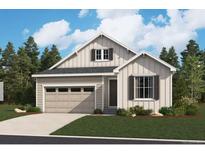 Charming single-Gathering home featuring a garage, tidy lawn, and stylish architectural details at 229 Wooten Ave, Brighton, CO 80601