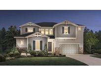 Charming two-story home with a gray exterior, lush landscaping, and a well-maintained front yard at 6289 Cristobal Pt, Parker, CO 80134