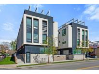 Modern townhome with striking architectural details and a well-manicured green space at 2150 S Delaware St, Denver, CO 80223
