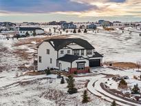 Beautiful two-story home featuring a modern design, attached garage, and set on a large lot at 3654 Paintbrush Ln, Parker, CO 80138
