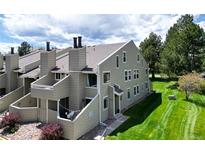 Inviting townhome with a private balcony, lush lawn, and charming curb appeal at 6899 Countryside Ln # 269, Niwot, CO 80503